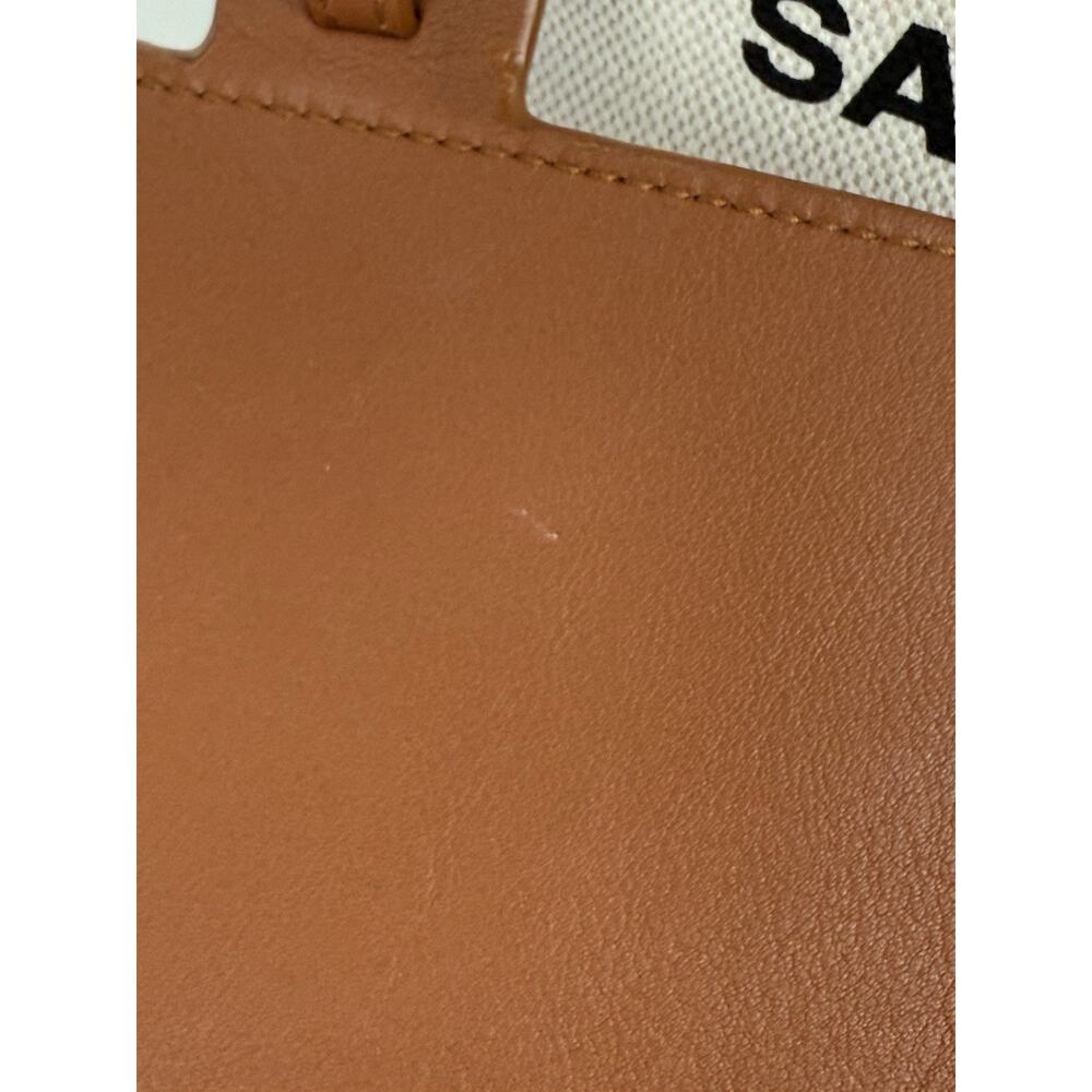 Saint Laurent Rive Gauche Linen Leather Women’s Bucket Bag in Beige - Picture 7 of 16